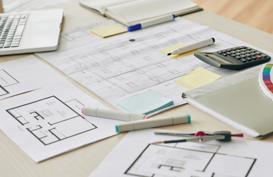 Home renovation plans and calculator illustrating renovation estimate breakdown planning