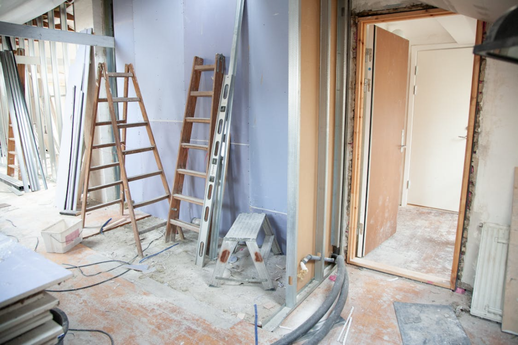 Interior reconstruction illustrating water damage restoration vs remodeling after demolition